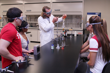 Organic chemistry faculty with students in the lab