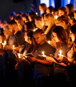 ADN Pinning Ceremony holding candles